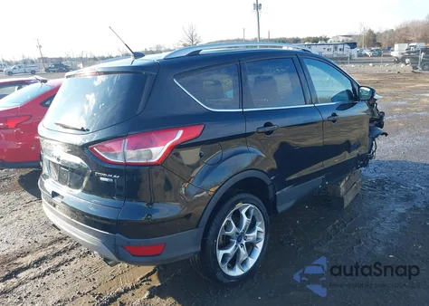 2016 Ford Escape Titanium z USA, uszkodzony, nr VIN 1FMCU9J92GUA36161